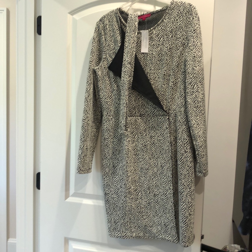 Black/cream pattern faux wrap dress.